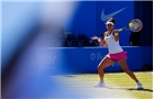 BIRMINGHAM, ENGLAND - JUNE 12:  Casey Dellacquia of Australia hits a return during Day Four of the Aegon Classic at Edgbaston Priory Club on June 12, 2014 in Birmingham, England.  (Photo by Paul Thomas/Getty Images)